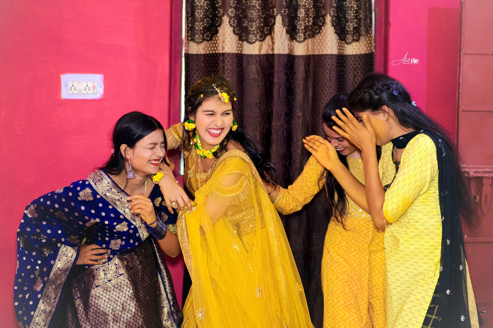 Laughter shared during a haldi celebration